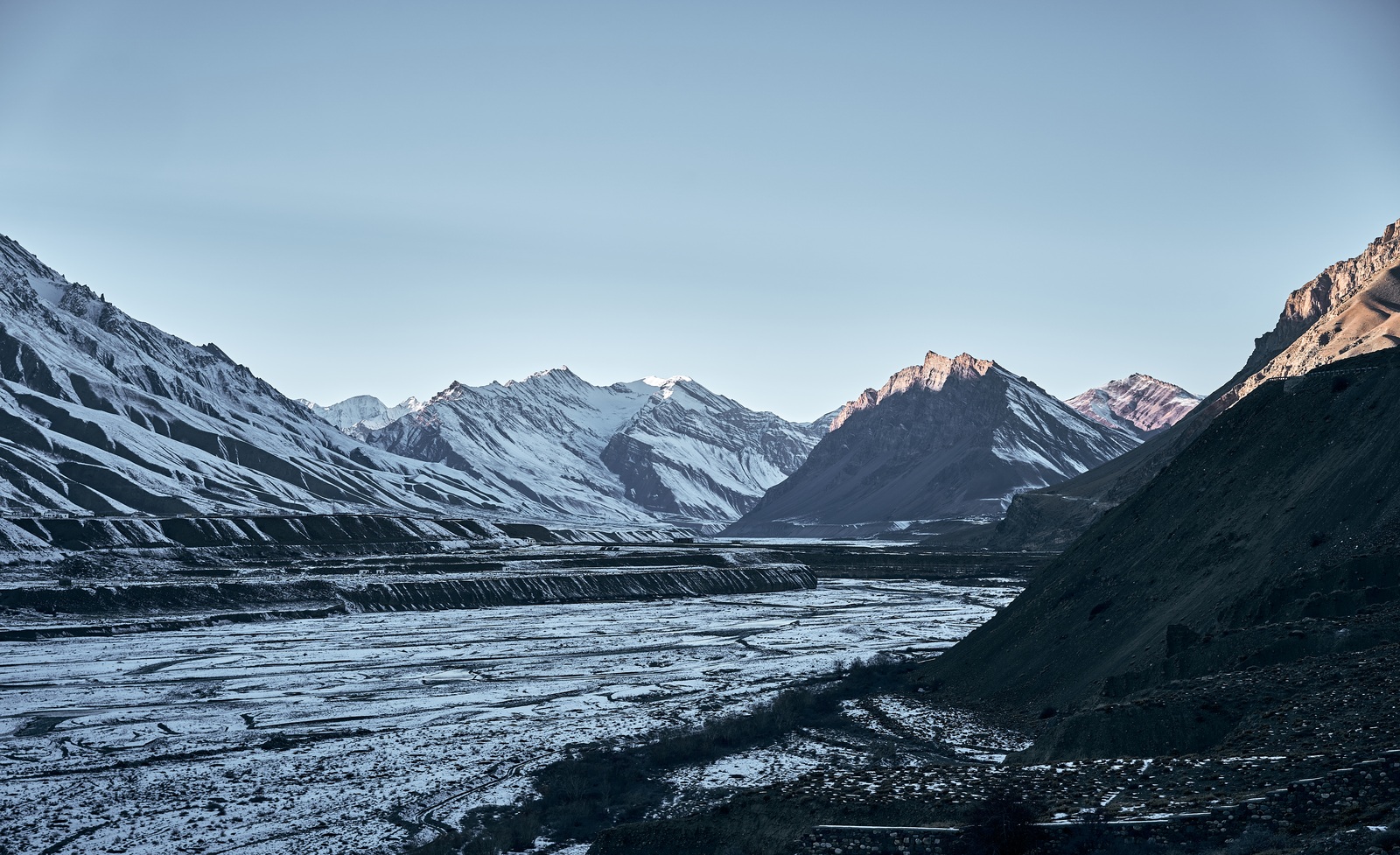 Snow-Covered Mountains And Valley